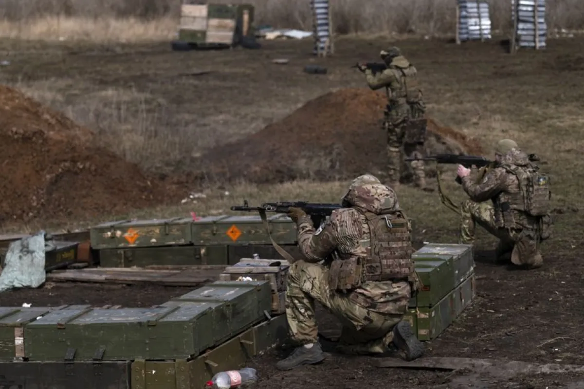 Ukrainian soldiers train near the frontline in eastern Ukraine's Donetsk region