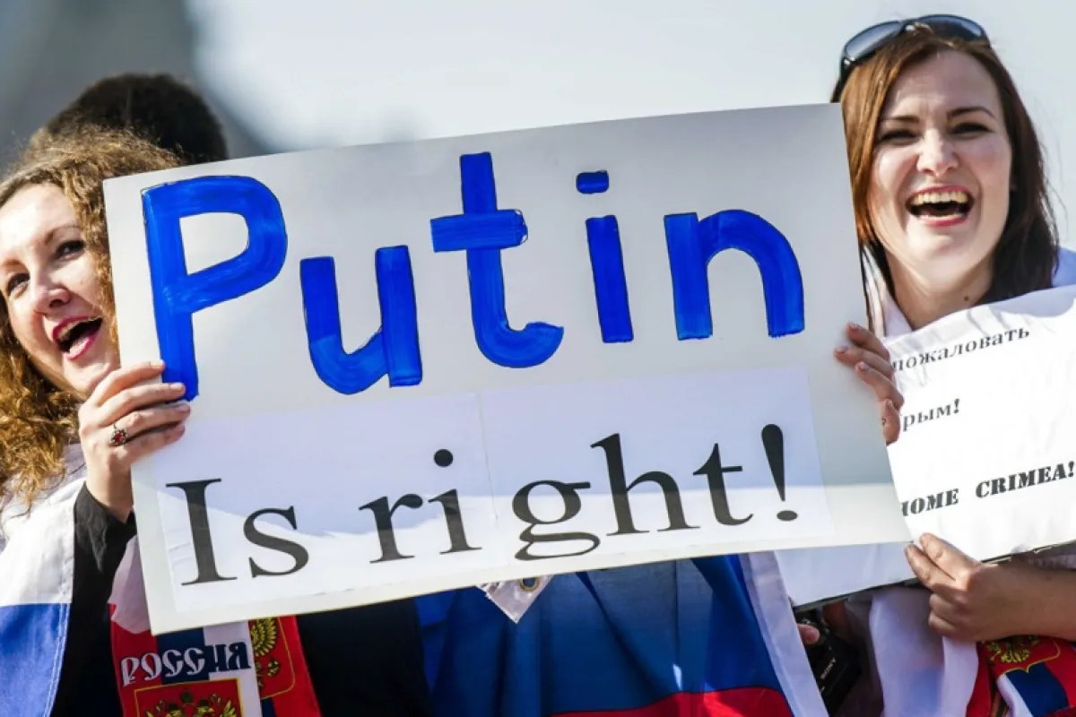 Pro-Russian supporters rally in front of the Peace Palace in The Hague
