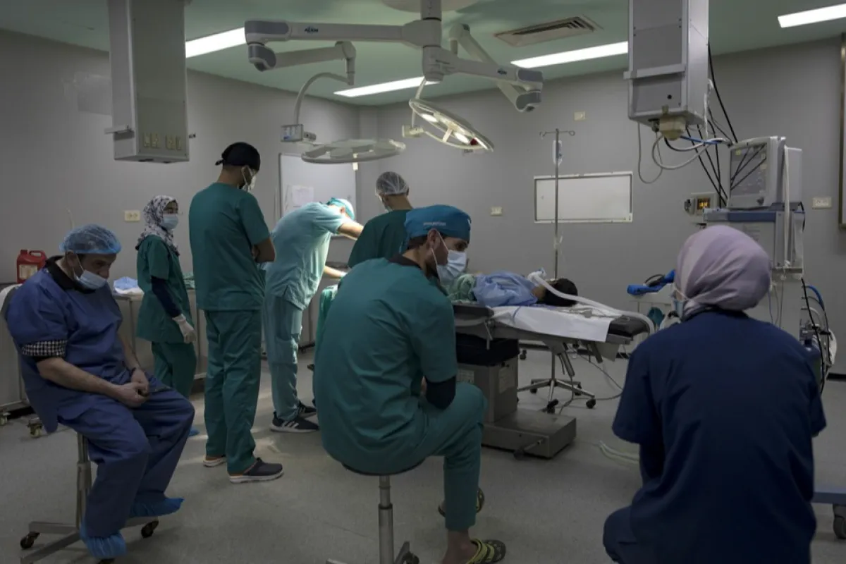 Palestinians receive treatment at Khan Yunis hospital as Israel continues to strike Gaza