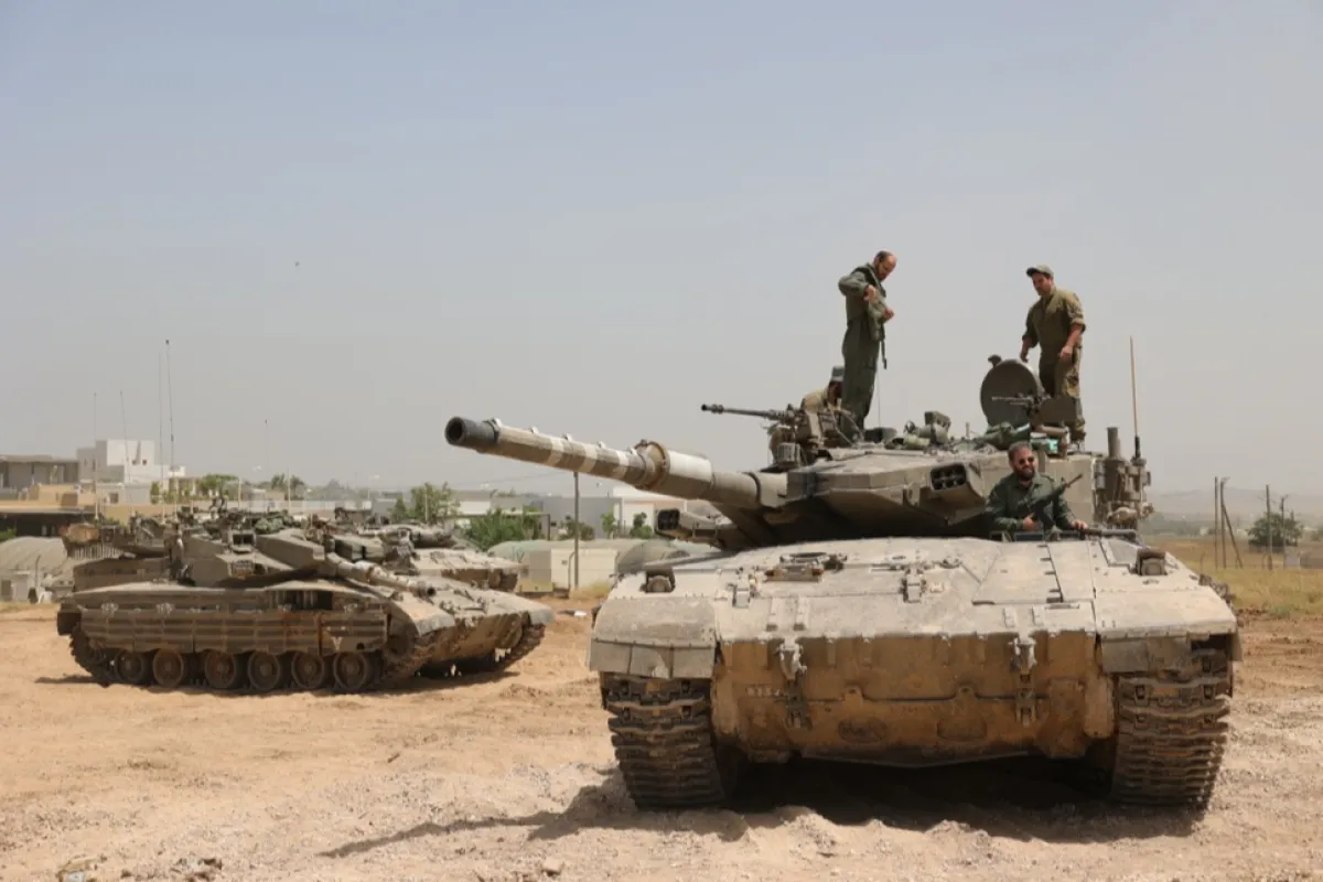 Israeli troops gather near the Gaza border, southern Israel