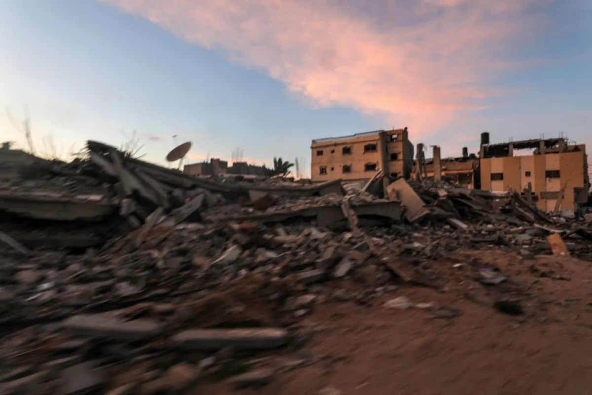 Internally displaced Palestinians relocate their camp after an evacuation order by Israel