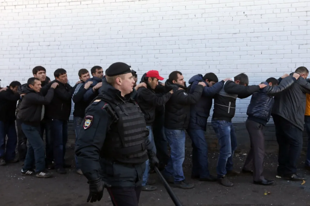Russian police detain alleged illegal migrants