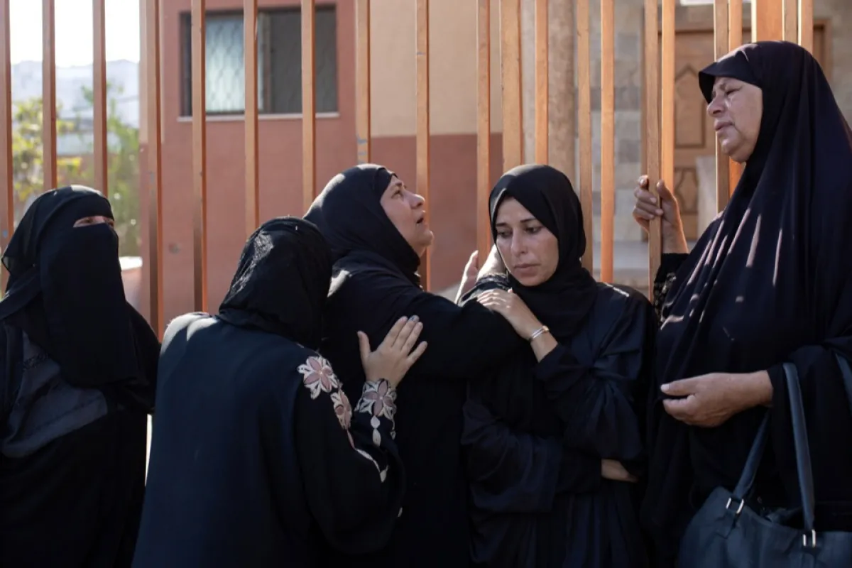 Palestinians mourn their dead after Israeli strike in Khan Yunis