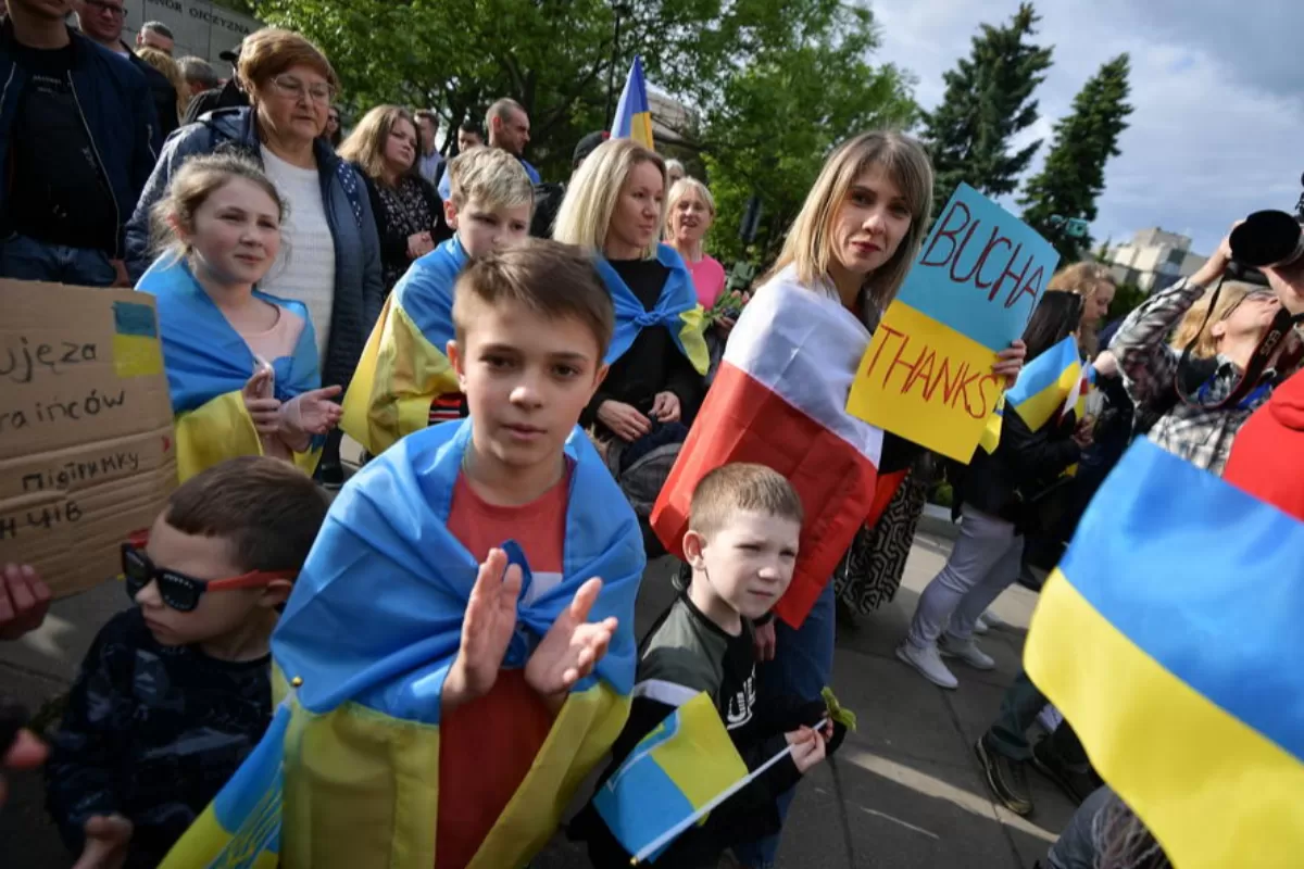 Cetățeni ucraineni în timpul Marșului Recunoștinței de la Varșovia, Polonia, 29 mai 2022.