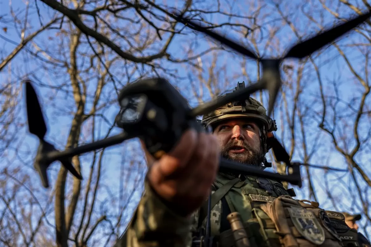 Ukrainian soldiers launch a drone at the frontline at the northern Kherson region, Ukraine, 07 November 2022.