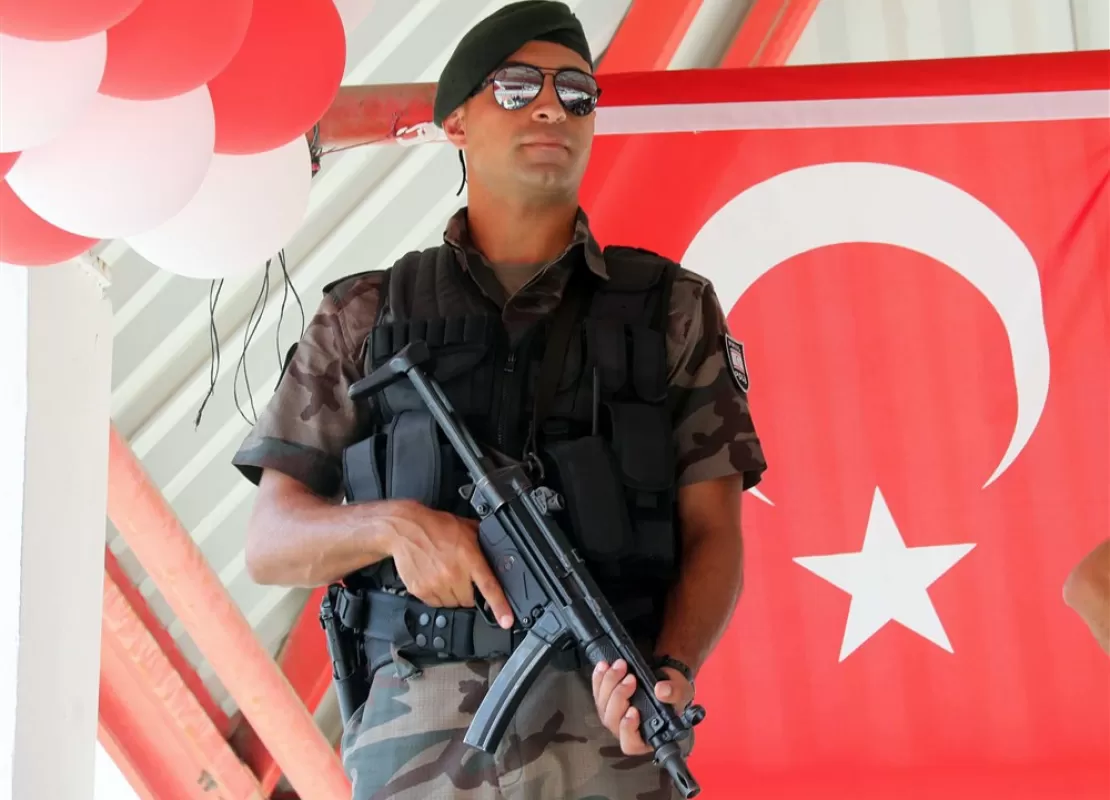 A military police stand guards during a military parade during the celebrate the 1974 Turkish invasion of northern Cyprus, in Nicosia, Cyprus, 20 July 2018.