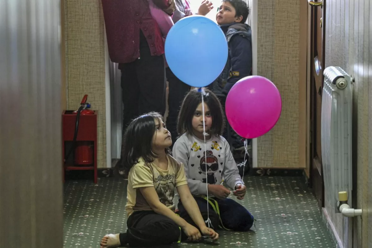 Copii din Mariupol se joacă într-un centr de cazare temporară pentru refugiați din regiunea Rostov, Rusia, 16 martie 2022.