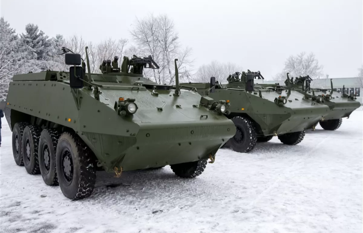 'Piranha-3 H' transporters are displayed during the official ceremony of receiving 'Piranha-3 H' transporters military vehicles at the Military Camp 142 in Chisinau, Moldova, 12 January 2023.