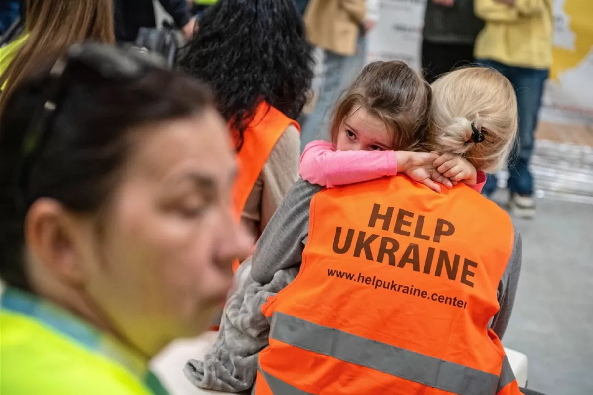 Volunteers work at the Help Ukraine Center in Lublin, southeastern Poland, 02 May 2022.