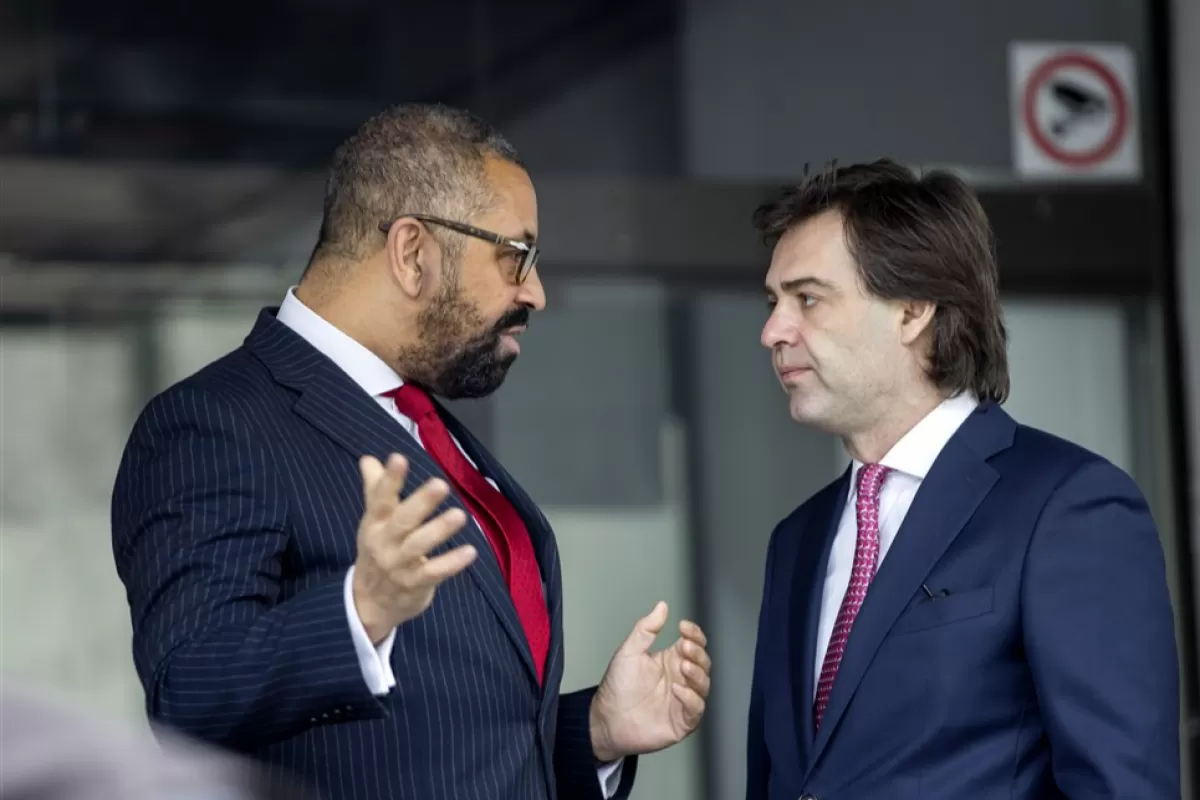 British Foreign Secretary James Cleverly (L) speaks with Moldova's Minister of Foreign Affairs and European Integration Nicu Popescu (R) after a joint press briefing during their meeting in Chisinau, Moldova, 16 March 2023.