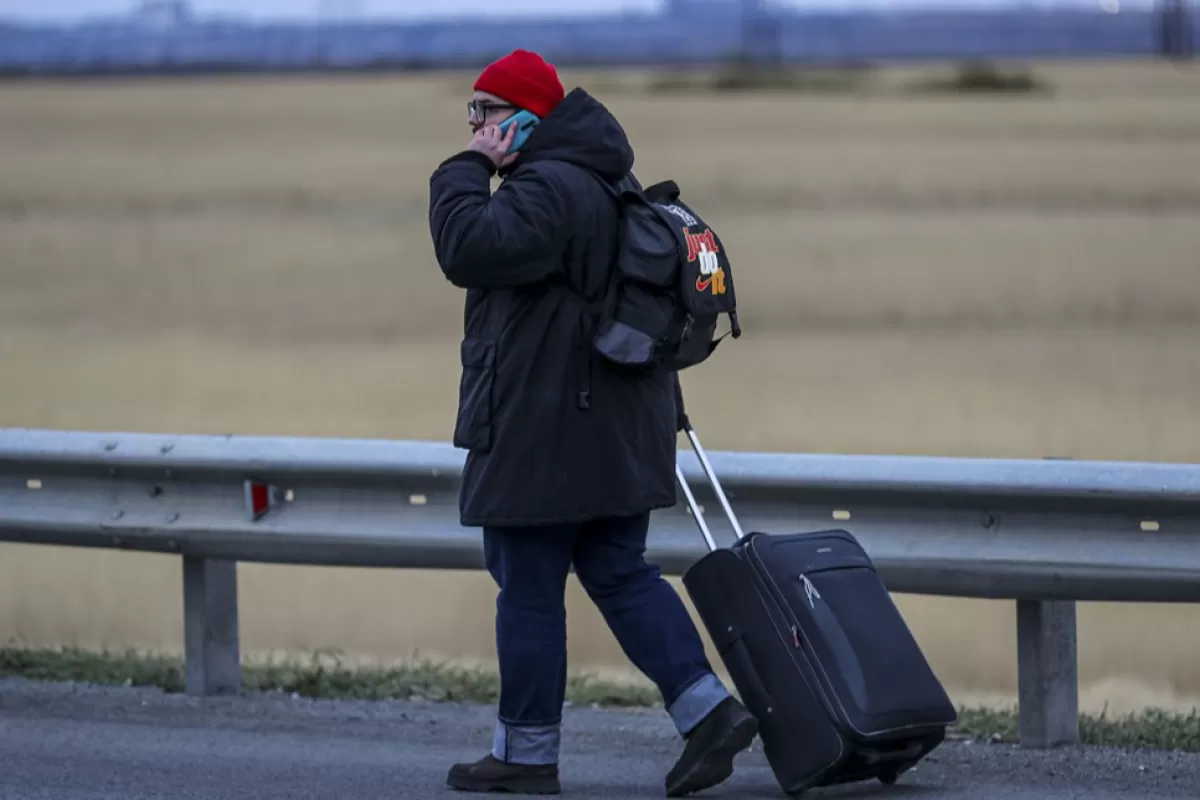 Russian men flee into neighboring Kazakhstan following Russia's partial military mobilization announcement