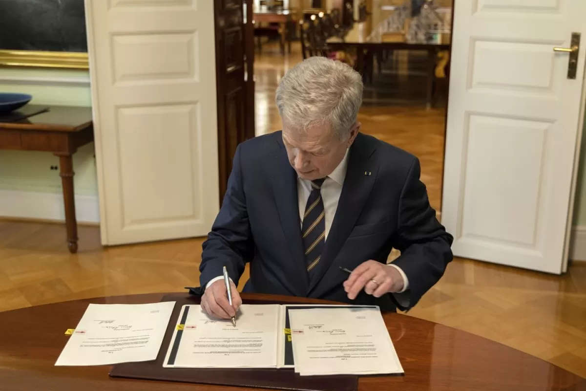 Finnish president signs national Nato legislation in Helsinki