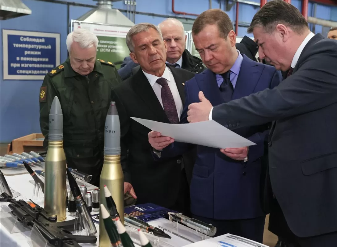Deputy head of Russia's Security Council Dmitry Medvedev (2-R) visits a weapons factory in Tatarstan, Russia, 29 March 2023.