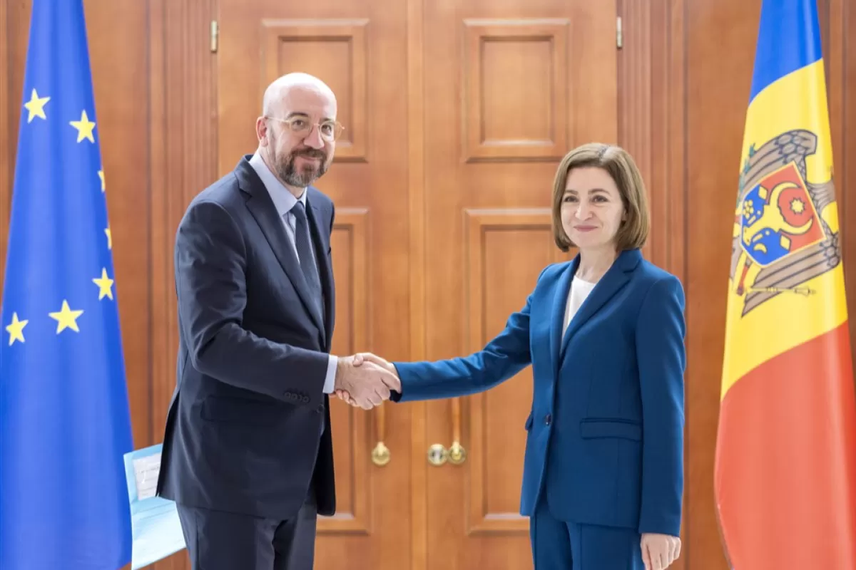 European Council President Charles Michel (L) shake hands with President of Moldova Maia Sandu (R) after a joint press conference in Chisinau, Moldova, 28 March 2023.