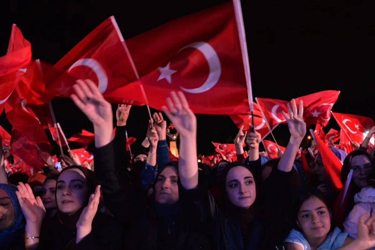 Supporters gather to hear Turkish President Recep Tayyip Erdogan give an address after winning re-election in Turkey's run-off vote, at the Presidential Palace in Ankara, Turkey, 28 May 2023.
