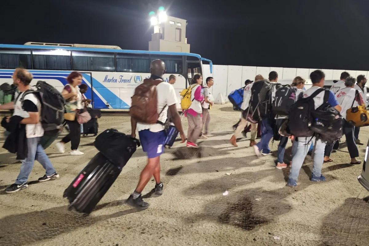 Rafah border crossing between Gaza and Egypt opens to allow limited evacuations