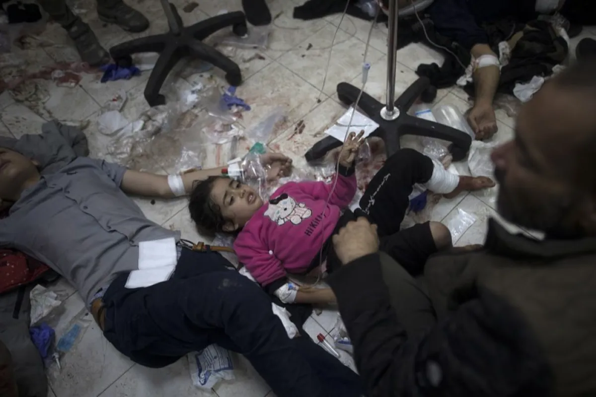 Injured Palestinians at Nasser Hospital following strikes on southern Gaza