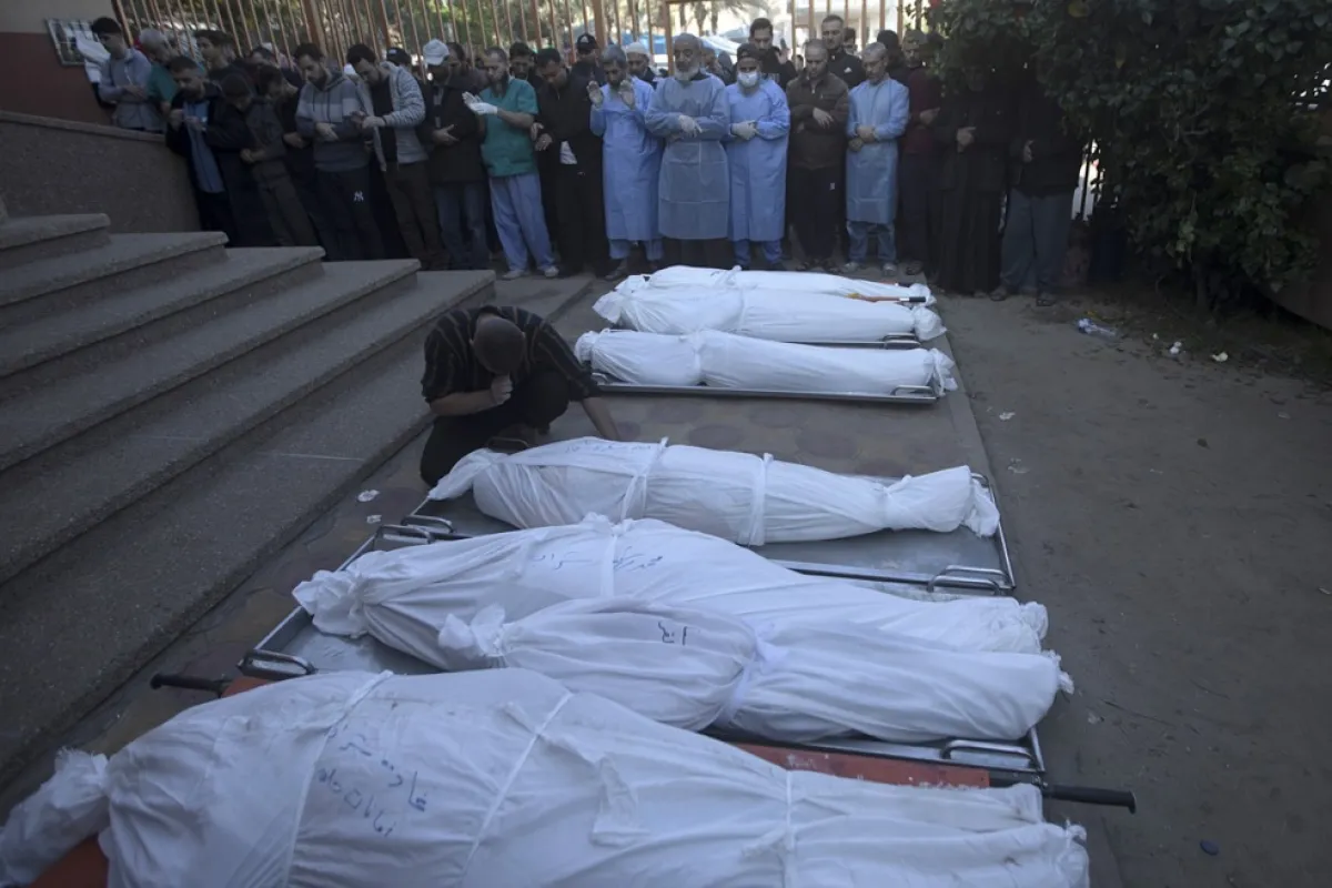 Palestinians mourn their dead as Israel continues to strike Gaza