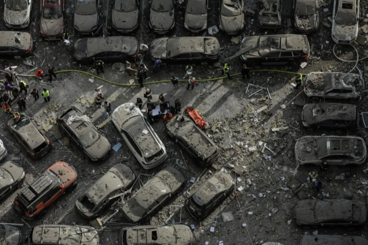 At least three killed as rocket fragments hit high-rise building in Kyiv