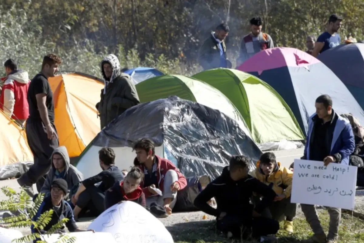 migranţi