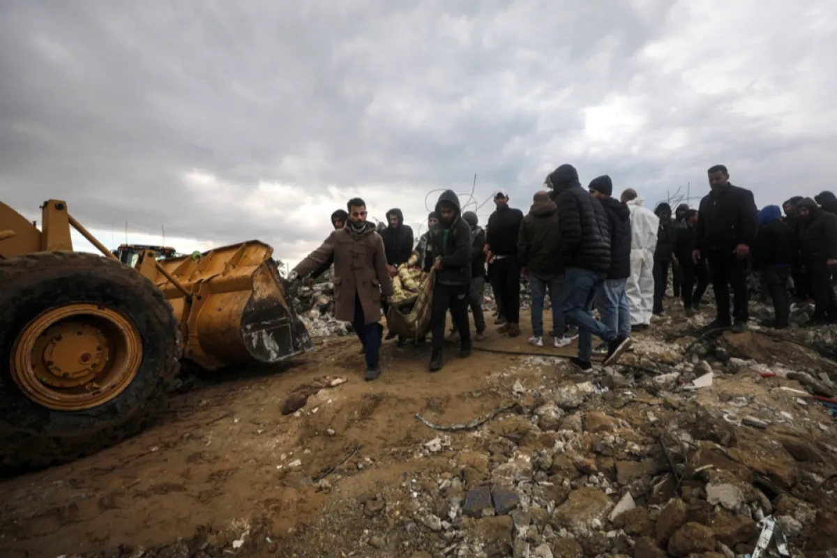Palestinians search for survivors after Israeli airstrikes in Deir Al Balah