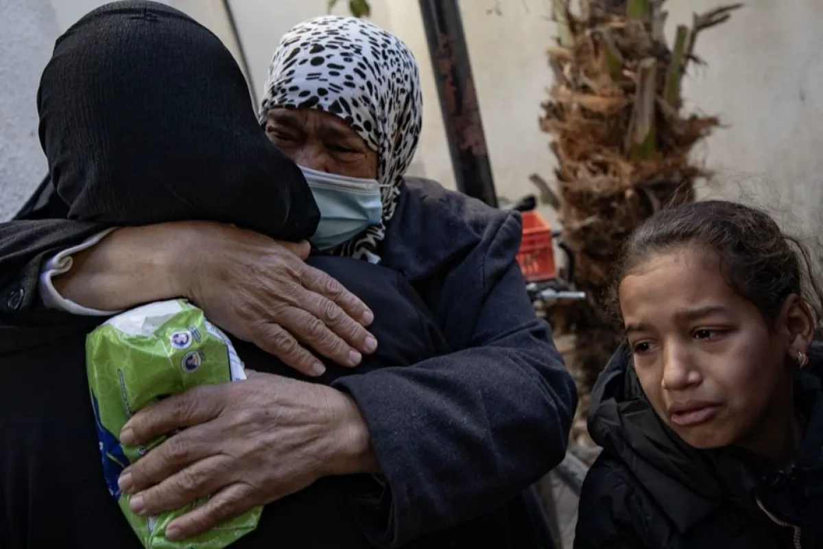 Palestinians mourn their dead following airstrike on Rafah, southern Gaza