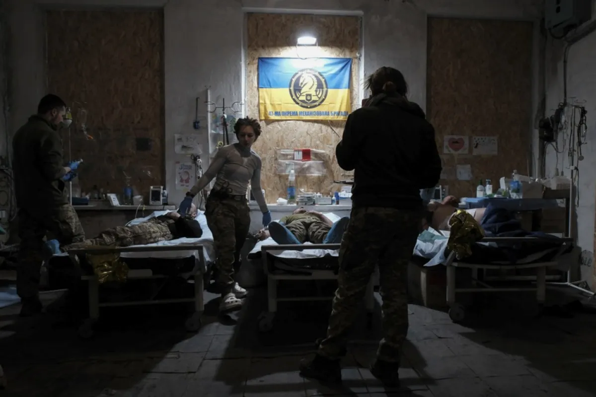 Military medics treat injured Ukrainian soldiers at frontline field hospital in Ukraine's Donetsk