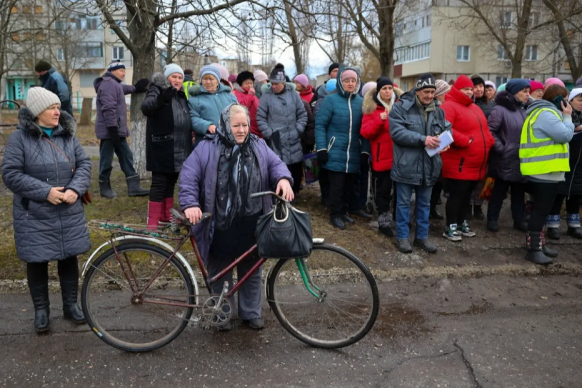 Ukrainians in Kupiansk receive food aid