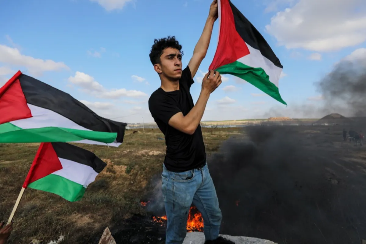 Palestinians hold a counter 'Flag March' against Israeli march