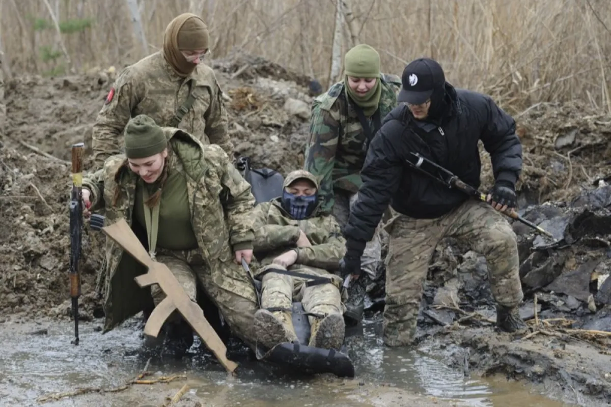 Young Ukrainian civilians receive military and first aid training in Western Ukraine